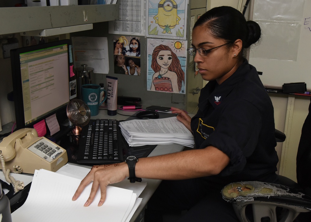 Sailor Performs Paperwork