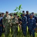 Sailors pose for a group photo at the Manell Watershed Restoration Project site