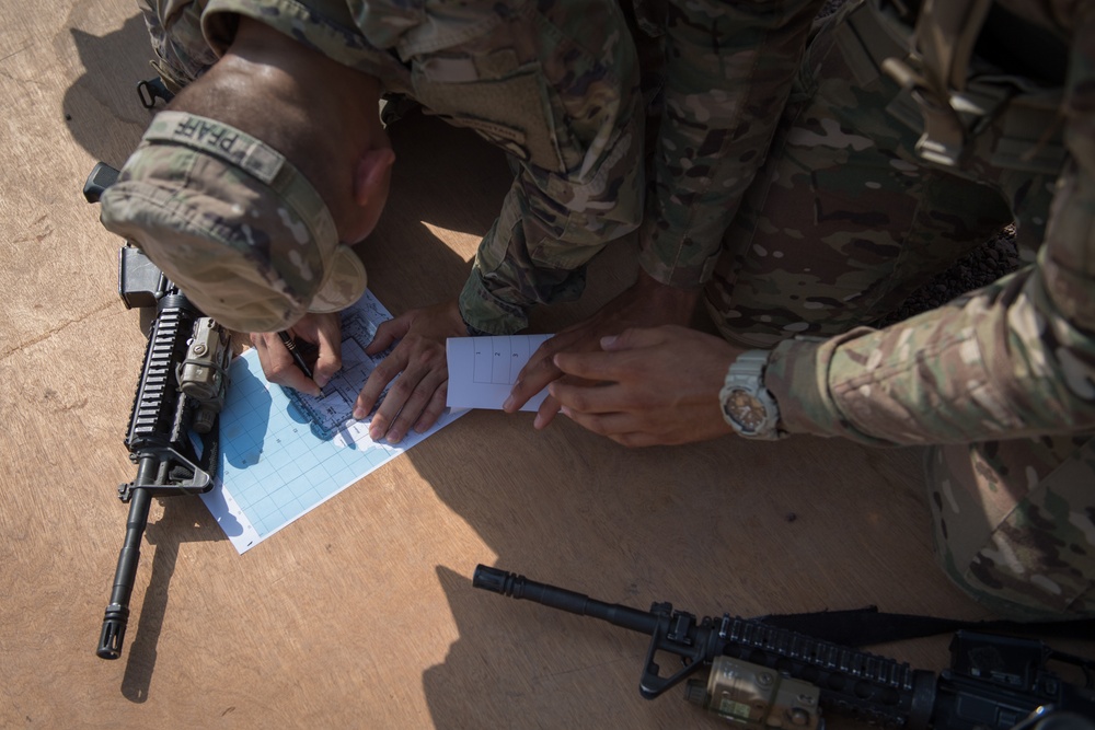 Deployed Army forces practice land navigation