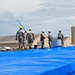 156th Civil Engineering Squadron repair roof with FEMA blue sheets