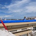 156th Civil Engineering Squadron repair roof with FEMA blue sheets