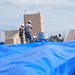 156th Civil Engineering Squadron repair roof with FEMA blue sheets