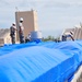 156th Civil Engineering Squadron repair roof with FEMA blue sheets