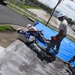 156th Civil Engineering Squadron repair roof with FEMA blue sheets