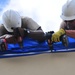 156th Civil Engineering Squadron repair roof with FEMA blue sheets