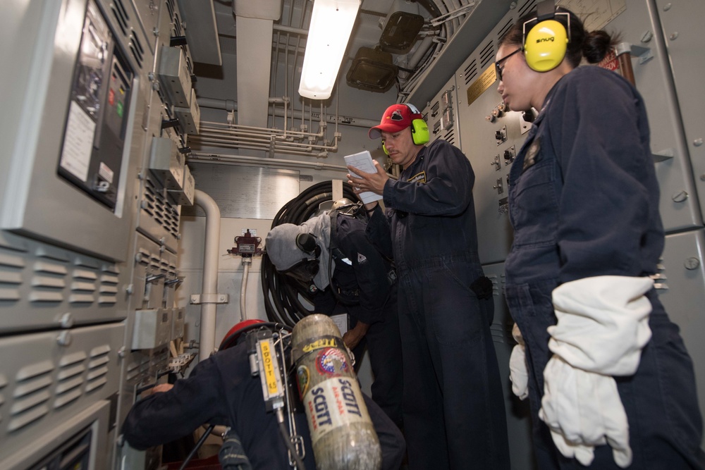 USS Pearl Harbor flight deck personnel launch and recover Army helicopters