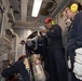 USS Pearl Harbor flight deck personnel launch and recover Army helicopters