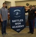 Midlothian Heritage High School student receives banner for participation in Marine Corps program