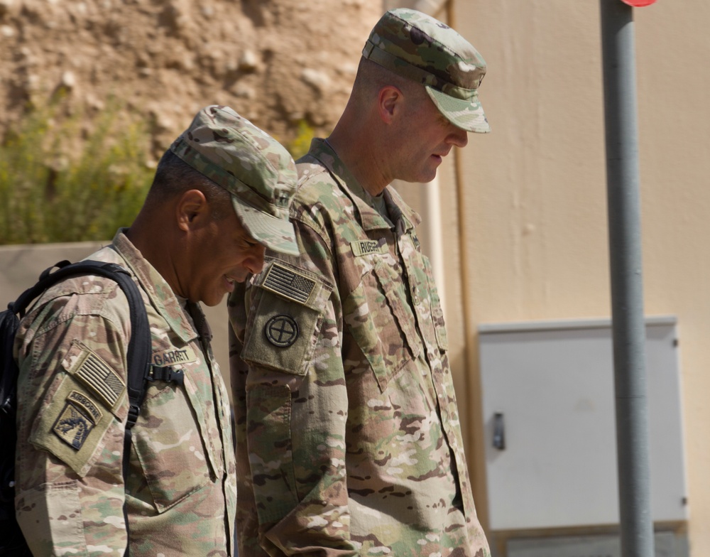 Lt. Gen. Michael Garrett meets junior officers during luncheon in Jordan