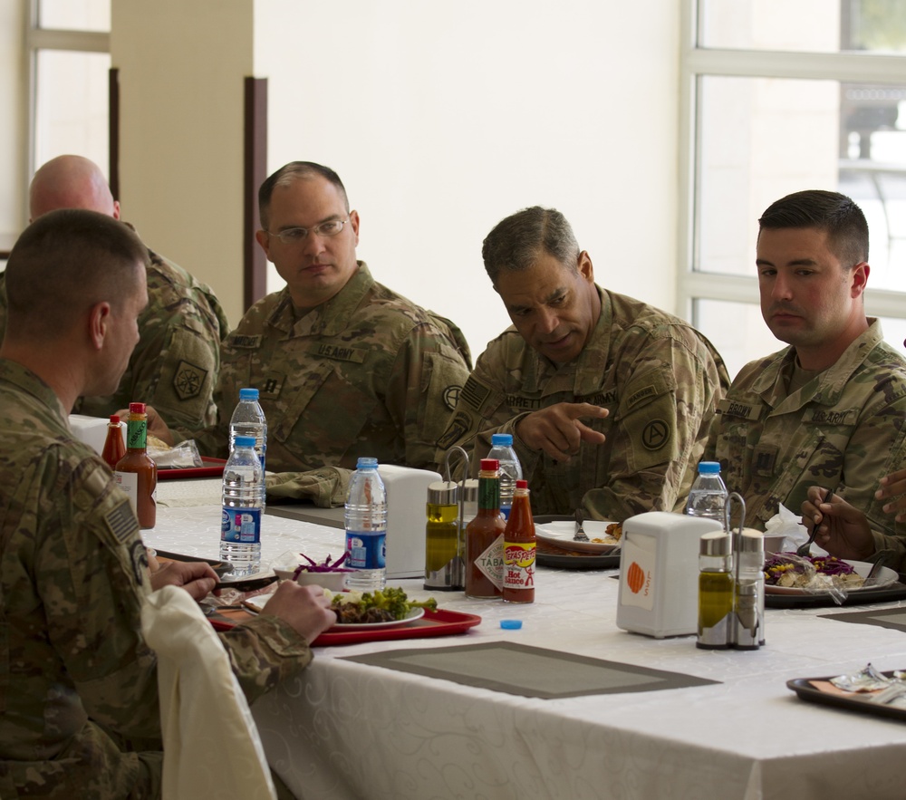 Lt. Gen. Michael Garrett meets junior officers during luncheon in Jordan