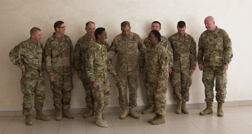 Lt. Gen. Michael Garrett meets junior officers during luncheon in Jordan