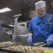USS Lake Erie (CG 70) CS2 prepares a meal for the crew