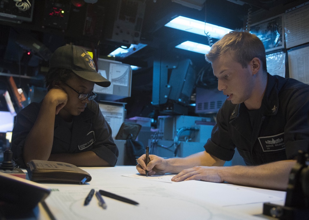 USS Lake Erie (CG 70) Operation Specialists work in CIC