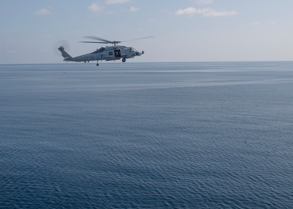 USS Lake Erie (CG 70) Sea Hawk flies above Gulf of Aden