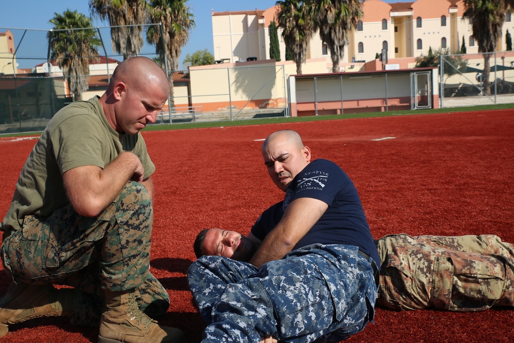 SPMAGTF-CR-AF Marines teach Italian Carabinieri and U.S. Sailors MCMAP