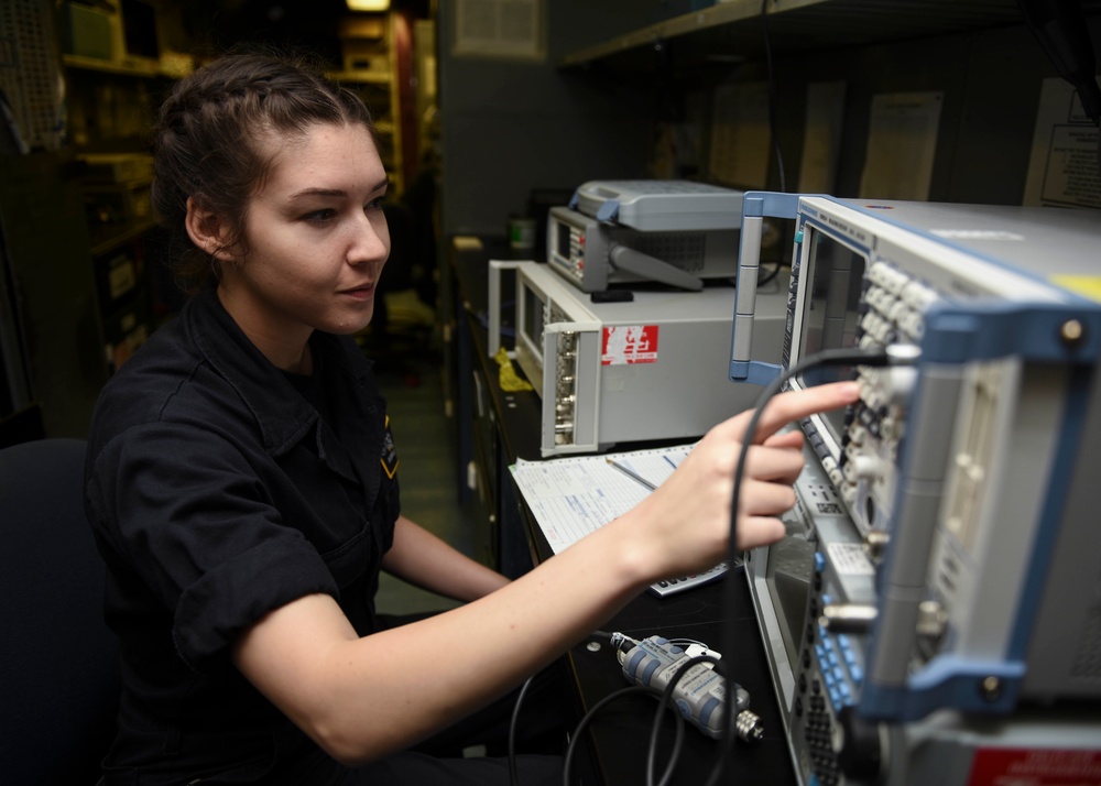 Sailor Calibrates Equipment