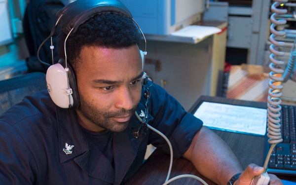 USS Lake Erie (CG 70) IT2 stands watch