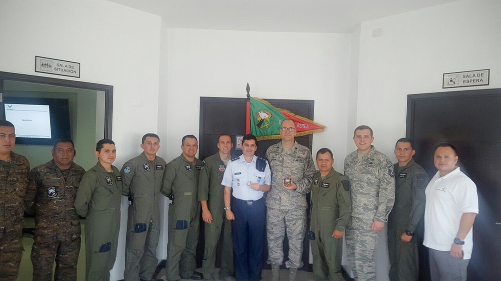 225th ADS exchange unit coins with Guatemalan Air Force