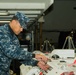 Sailor Conducts Maintenance