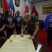 Brig. Gen. Rock signs Domestic Violence Awareness Month Proclamation aboard Camp Foster