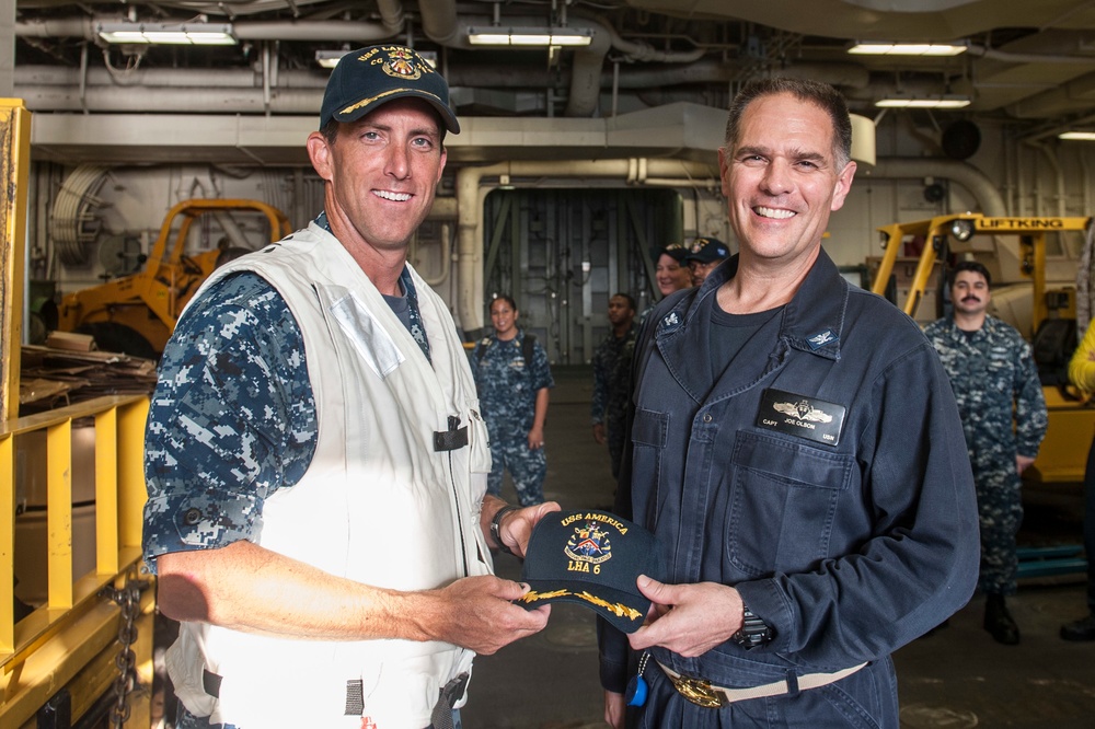 Sailors maintain weapons