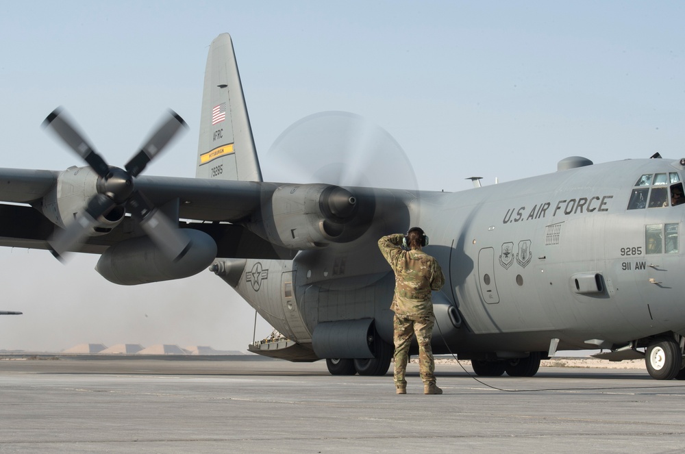 746th Expeditionary Airlift Squadron transporting passengers and cargo