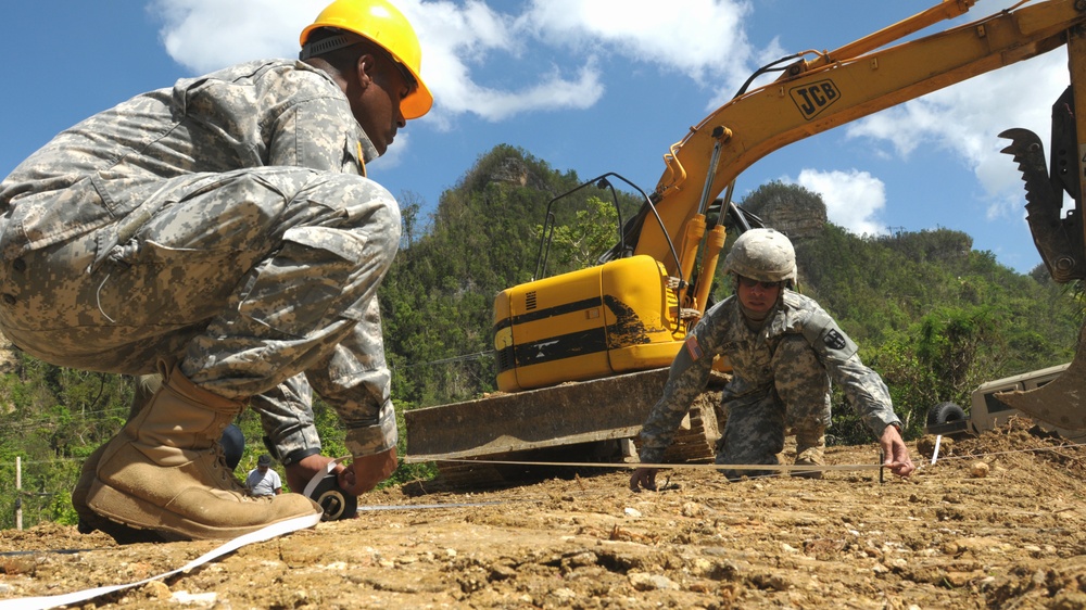 Puerto Rico Army National Guardsmen prepare for construction of bridge