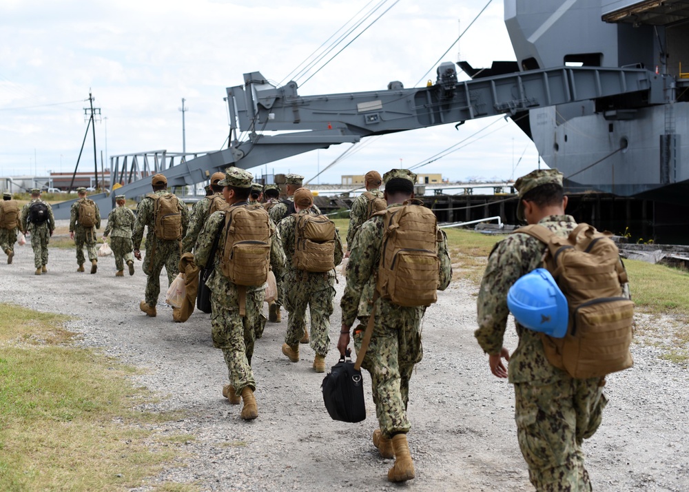 NCHB-1 Cargo Handlers Embark.