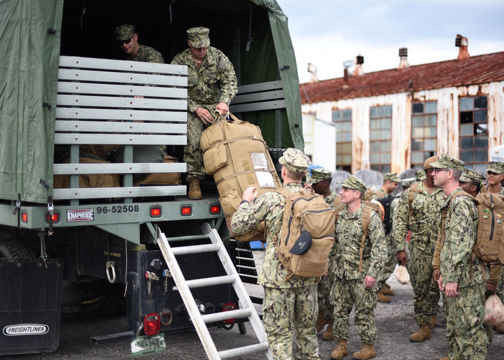 NCHB-1 Cargo Handlers Embark.