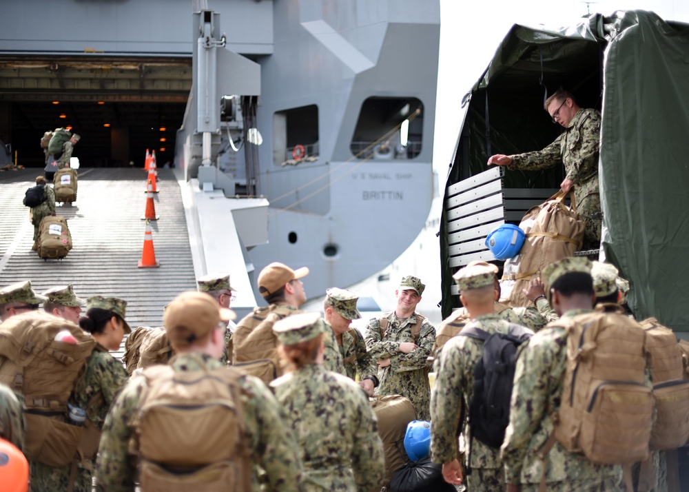 NCHB-1 Cargo Handlers Embark.