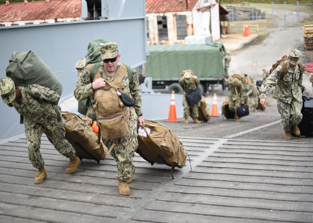 NCHB-1 Cargo Handlers Embark.