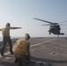 UH-60 of UAE Joint Aviation Command performs DLQs on the flight deck of USS Pearl Harbor