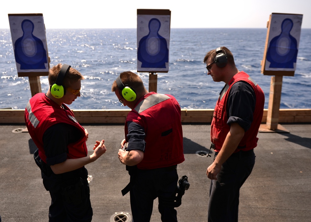 Nimitz Sailors Perform Small Arms Qual