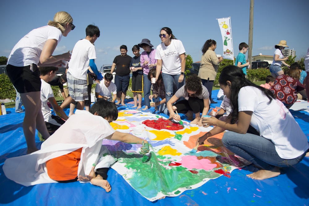 Local and military communities come together to create art banner