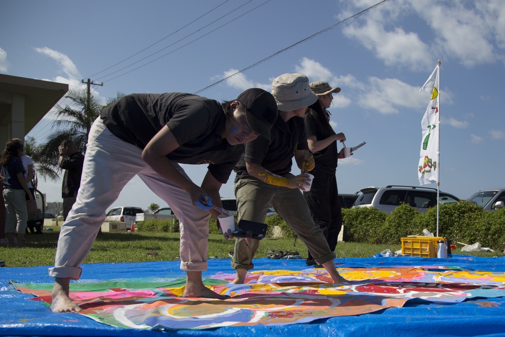 Local and military communities come together to create art banner