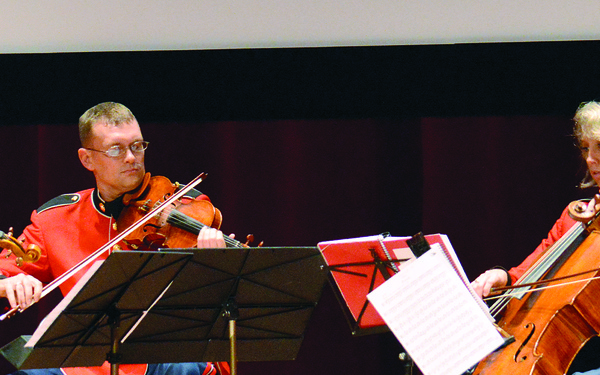 Whimsical strings resonate within Marine Corps University’s Warner Auditorium
