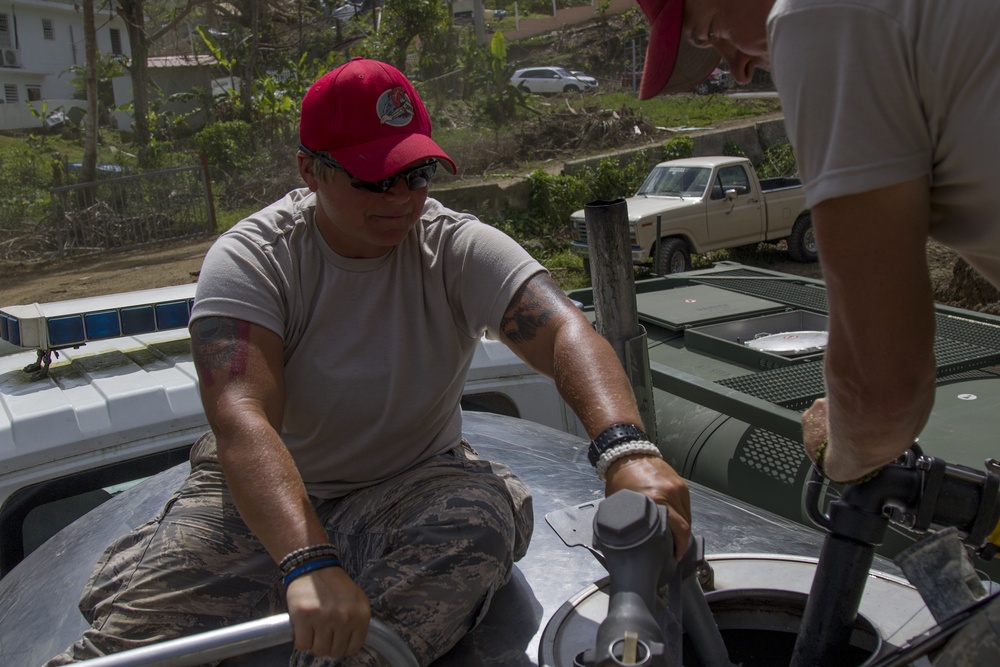 Airman Fills Water Truck