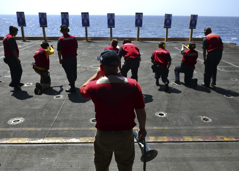 Nimitz Sailors Perform Small Arms Qual