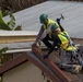 Contractors Remove Damaged Roofing