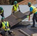 Contractors Remove Damaged Roofing