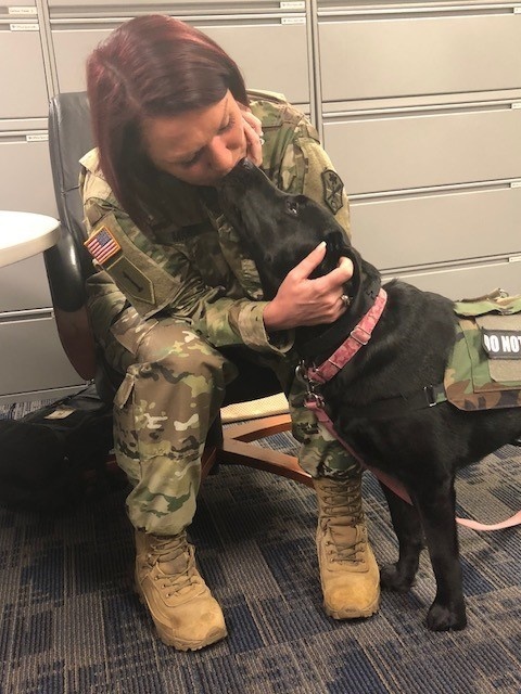 Life with Lizzy: How a service dog is helping one combat veteran reconnect