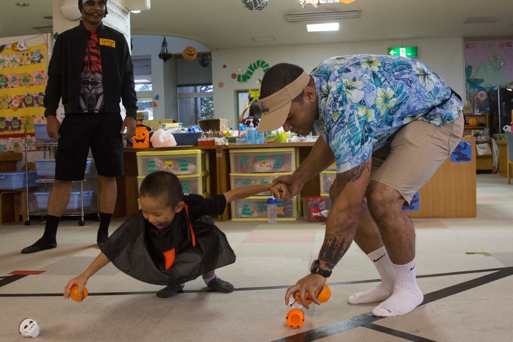 31st MEU Marines and Sailors trick or treat with children in Okinawa
