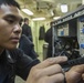 USS America Sailor installs hard drive