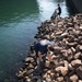 USS Bonhomme Richard (LHD 6) Sailors participate in base waterfront clean up