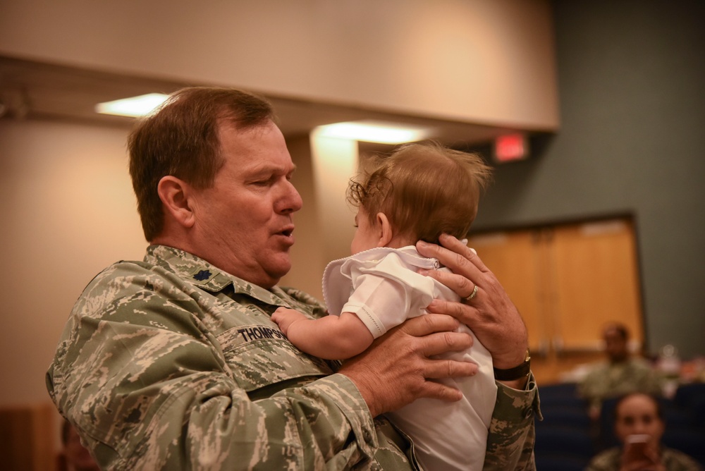 Chaplain baptizes 403rd Wing child