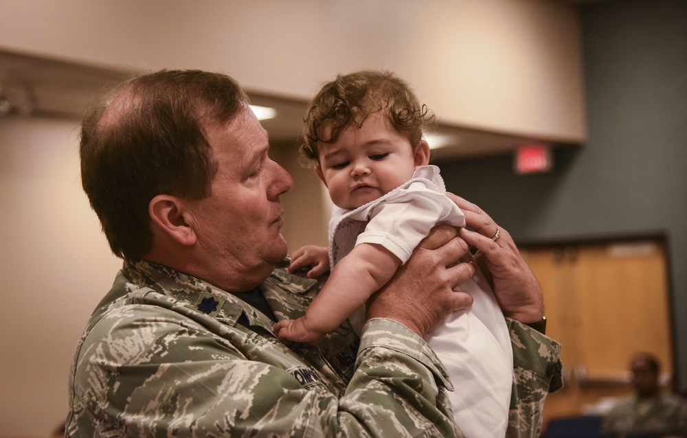 Chaplain baptizes 403rd Wing child