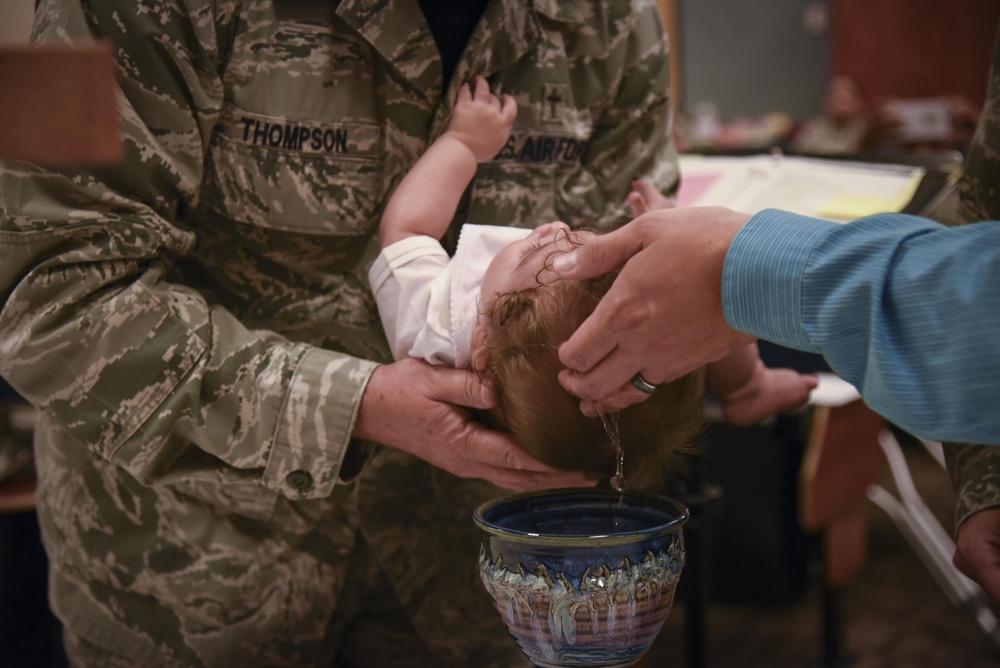 Chaplain baptizes 403rd Wing child