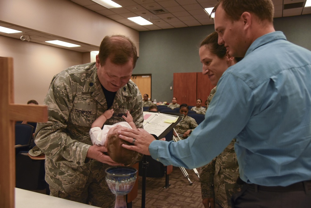 Chaplain baptizes 403rd Wing child