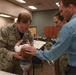 Chaplain baptizes 403rd Wing child
