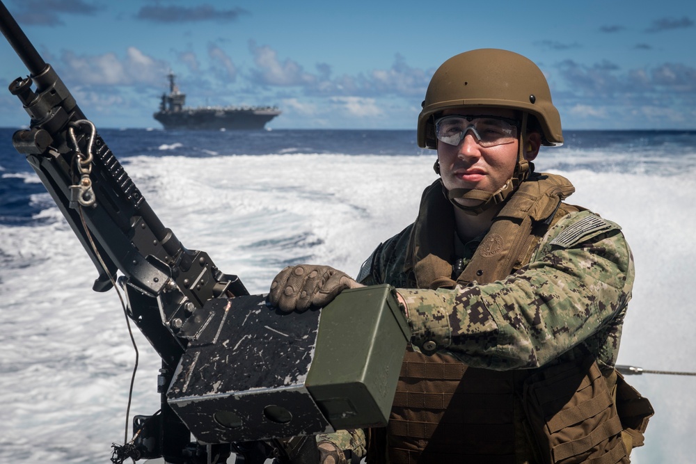 CRS 2 Escorts USS Roosevelt to Apra Harbor